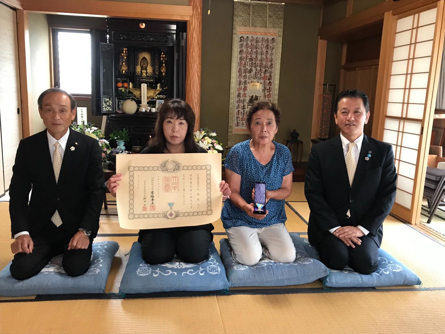 叙勲を伝達